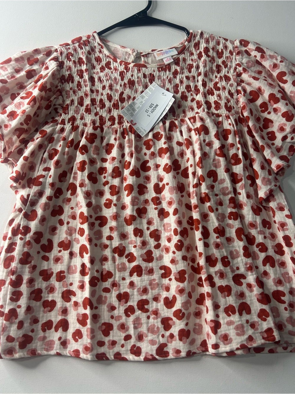 NWT Lularoe Small Maddy Pink Patterned Flutter Short Sleeve Top